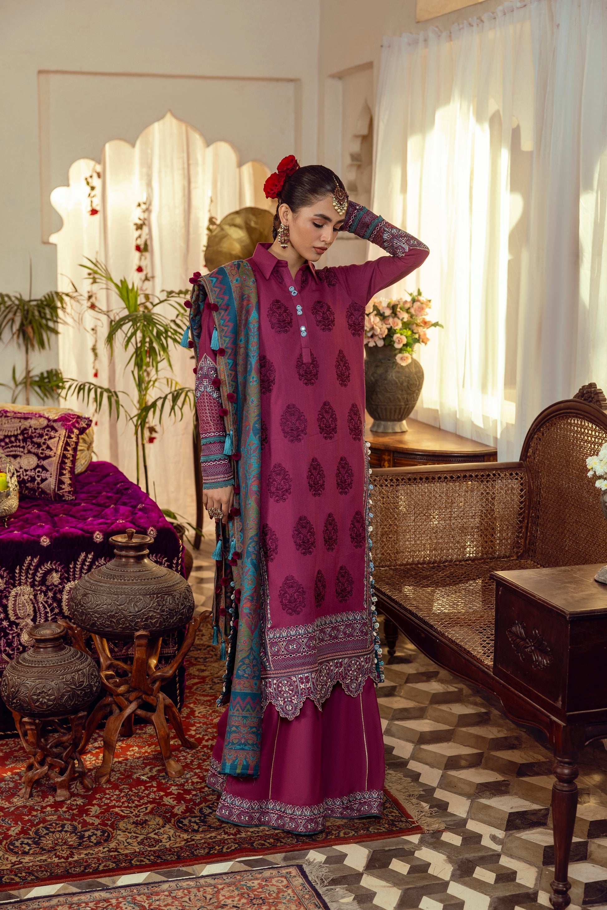 A finely stitched Marina suit paired with a warm shawl.