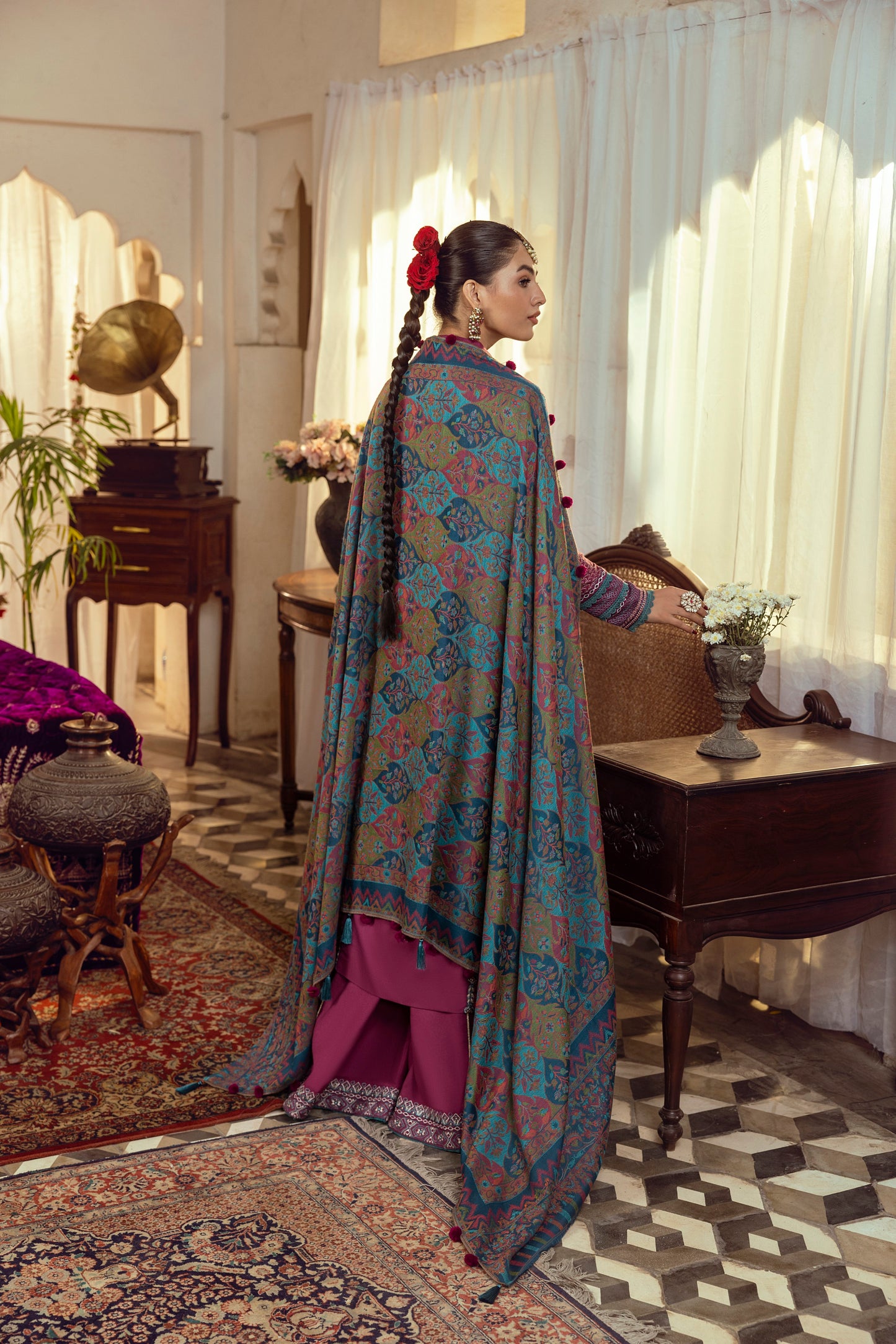 A Marina outfit with linear embroidery and a warm shawl.