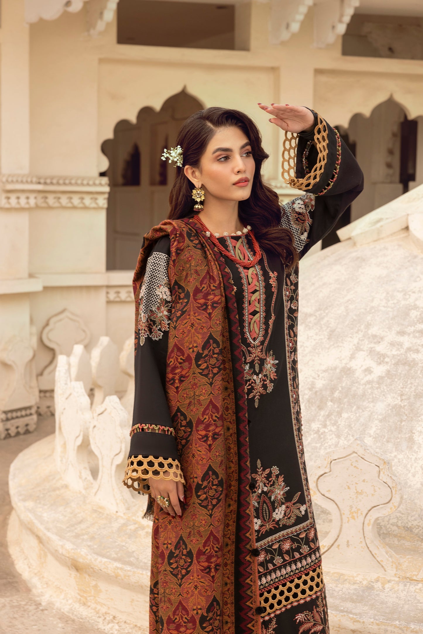 A luxury winter dress combining Marina wool, delicate embroidery, organza neck patchwork, and an artisanal Kashmiri shawl.