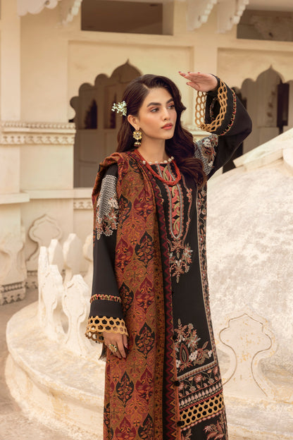 A luxury winter dress combining Marina wool, delicate embroidery, organza neck patchwork, and an artisanal Kashmiri shawl.