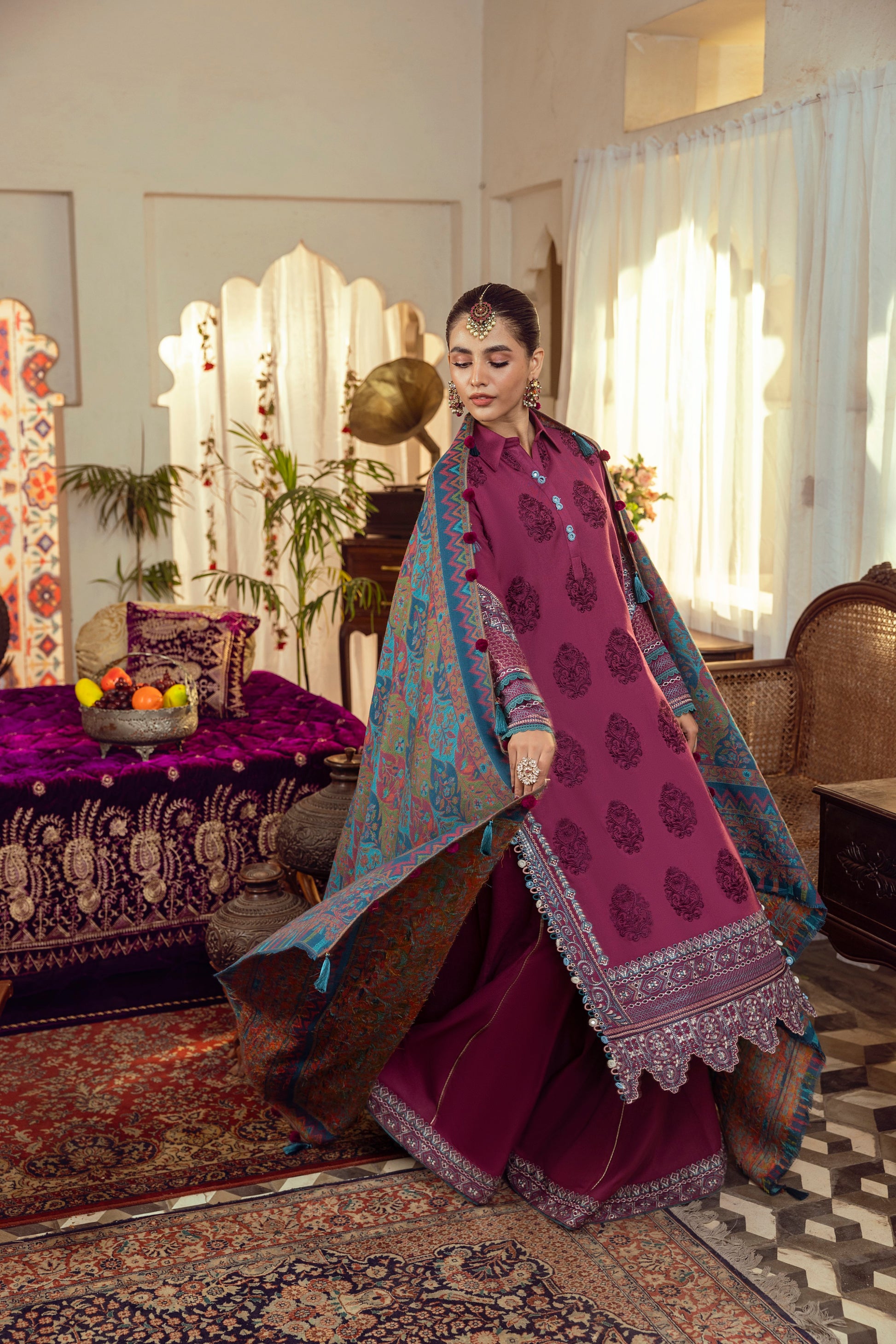 A neat winter outfit with embroidered front and Kashmiri shawl.