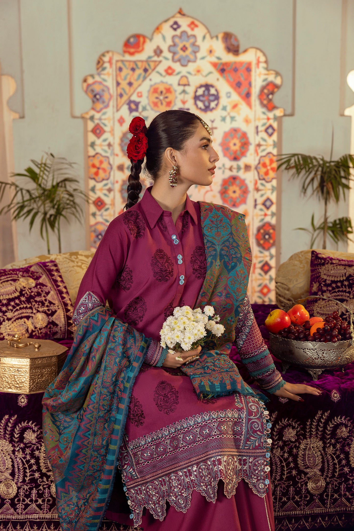 A plain, soft Marina winter dress with embroidered front and shawl.