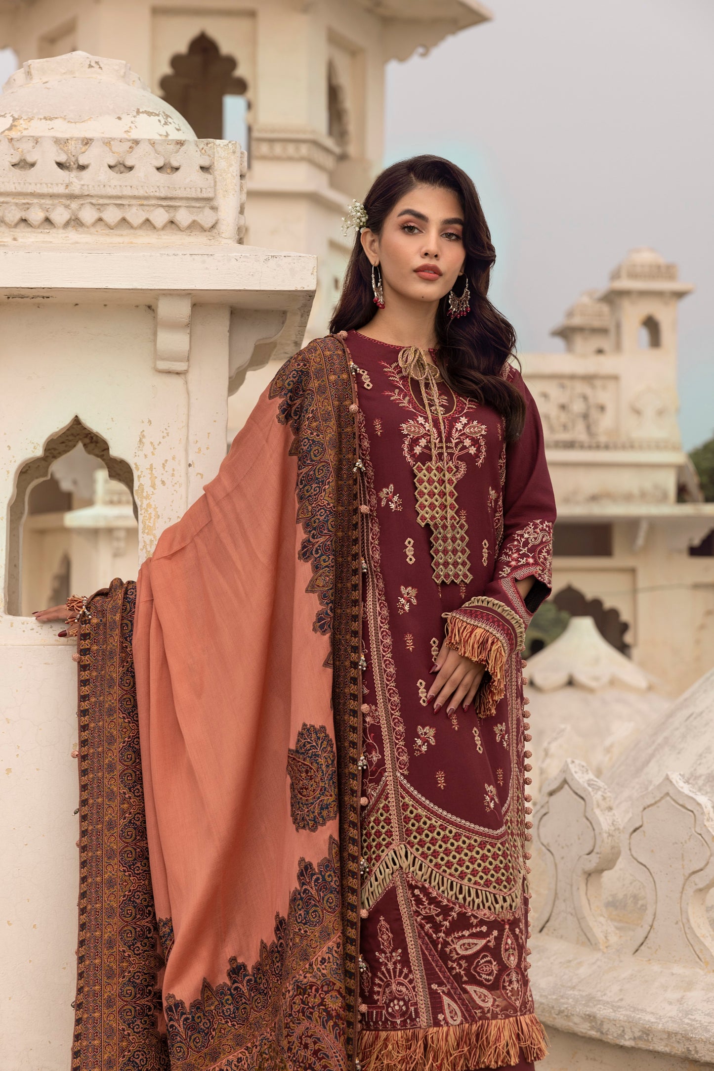 A warm Marina winter outfit with light embroidery and a soft shawl.