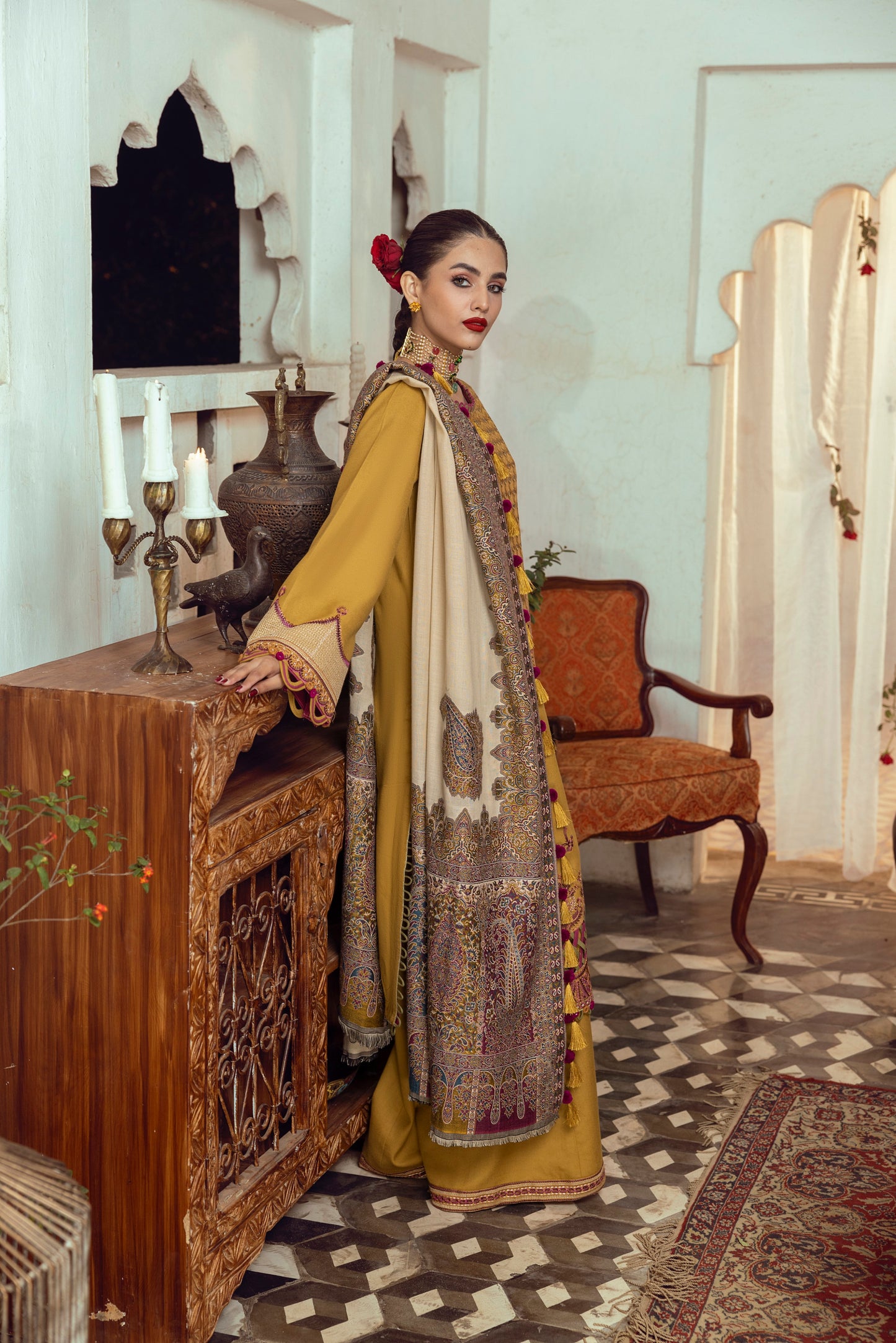 A soft winter outfit featuring whisper-light organza neck detailing, detailed embroidery, and a woven Kashmiri shawl.