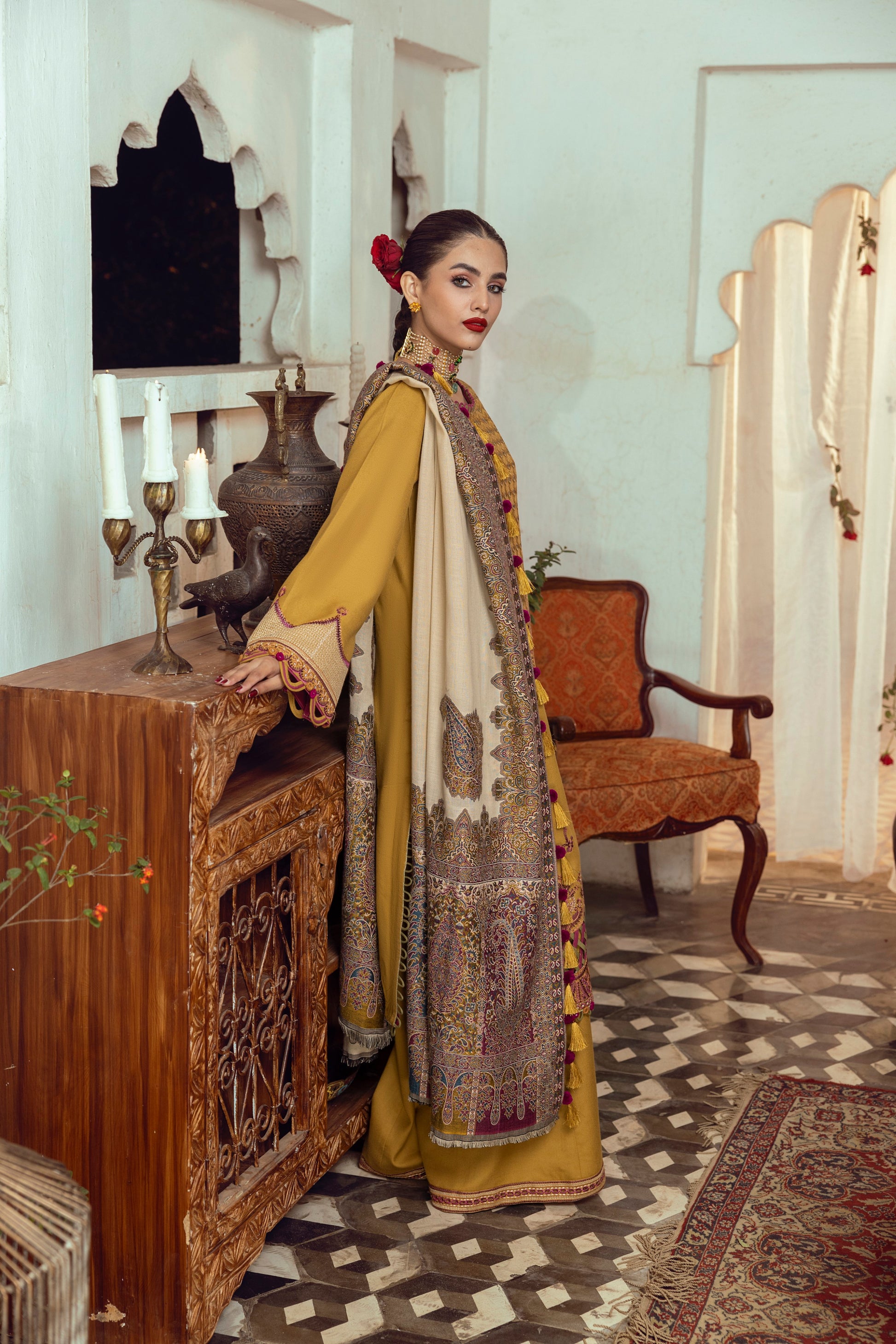 A soft winter outfit featuring whisper-light organza neck detailing, detailed embroidery, and a woven Kashmiri shawl.