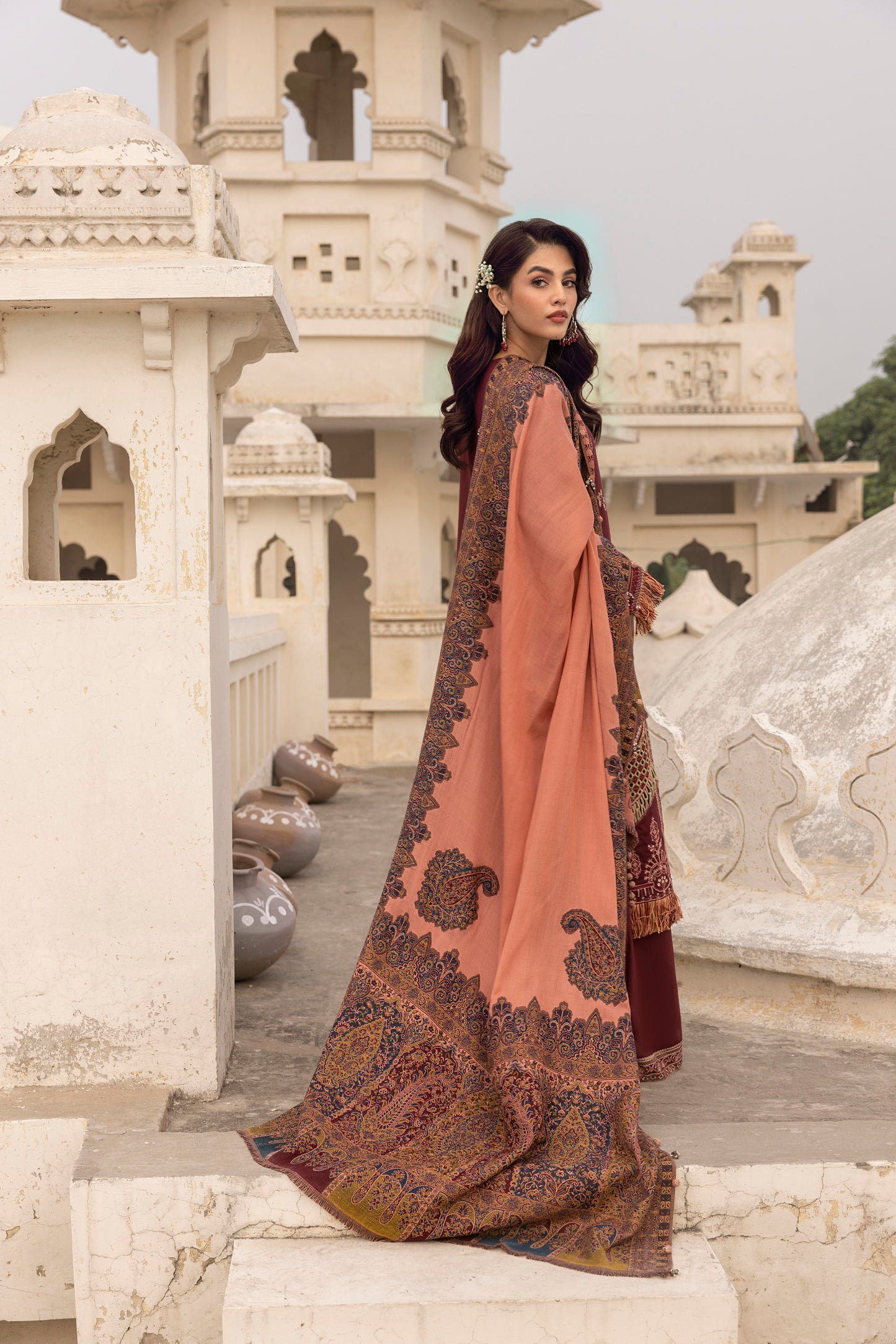 A wool-style Marina dress with organza neck patch and woven shawl.