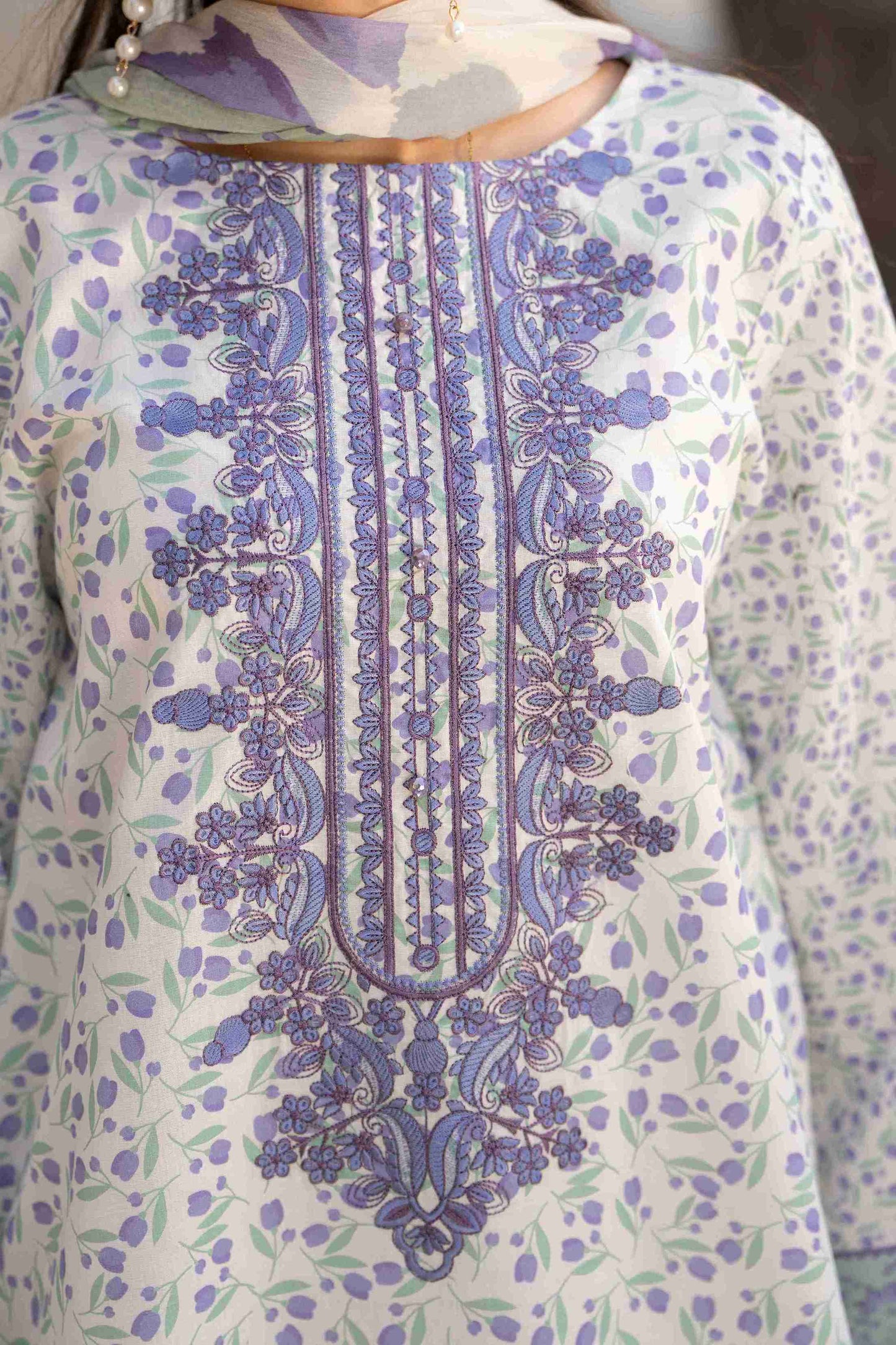 Premium lawn kurta with embroidered neckline, soft chiffon dupatta, and pure cotton trouser for a chic eastern look