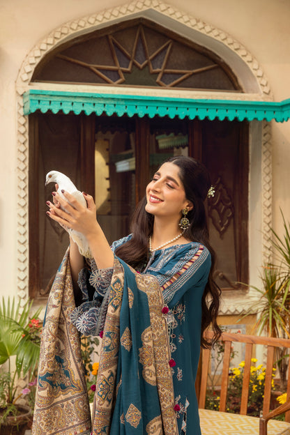 Warm Marina ensemble enhanced with handwoven Kashmiri craftsmanship, embroidered shirt front, and sleek trouser piece.