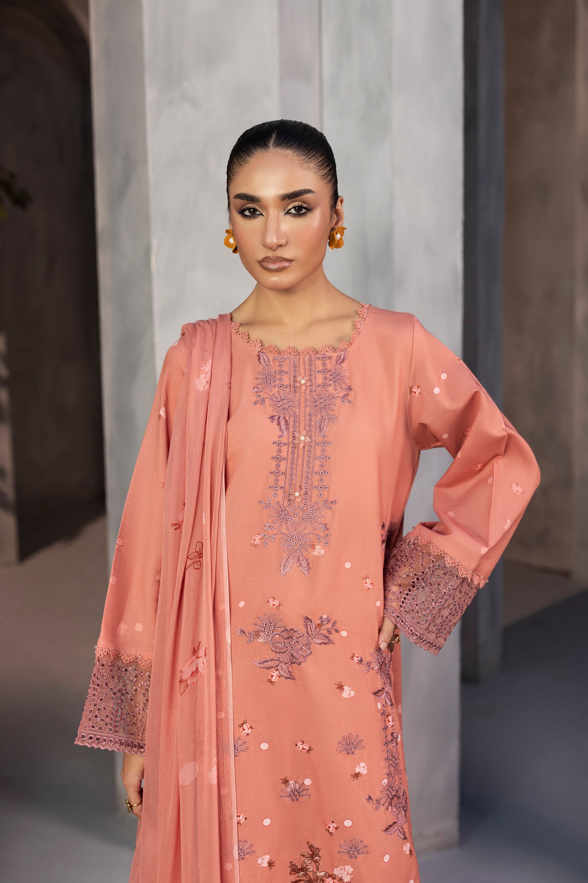 Elegant embroidered Karandi winter suit inspired by eastern traditional fashion