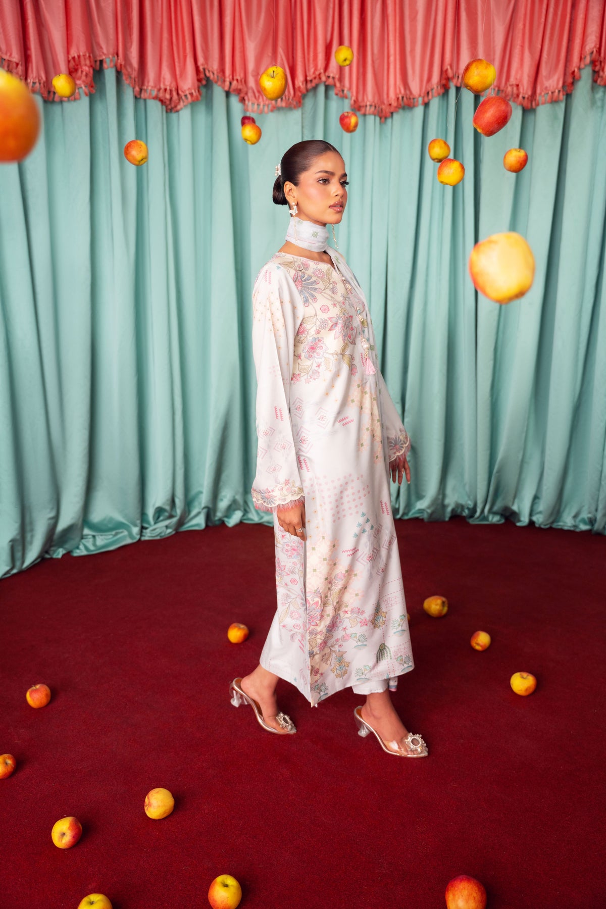 Pakistani silk dress for girls featuring an unstitched 3PC raw silk shirt and trousers paired with a lightweight chiffon dupatta, offering a traditional Eastern look with flexible styling for special occasions