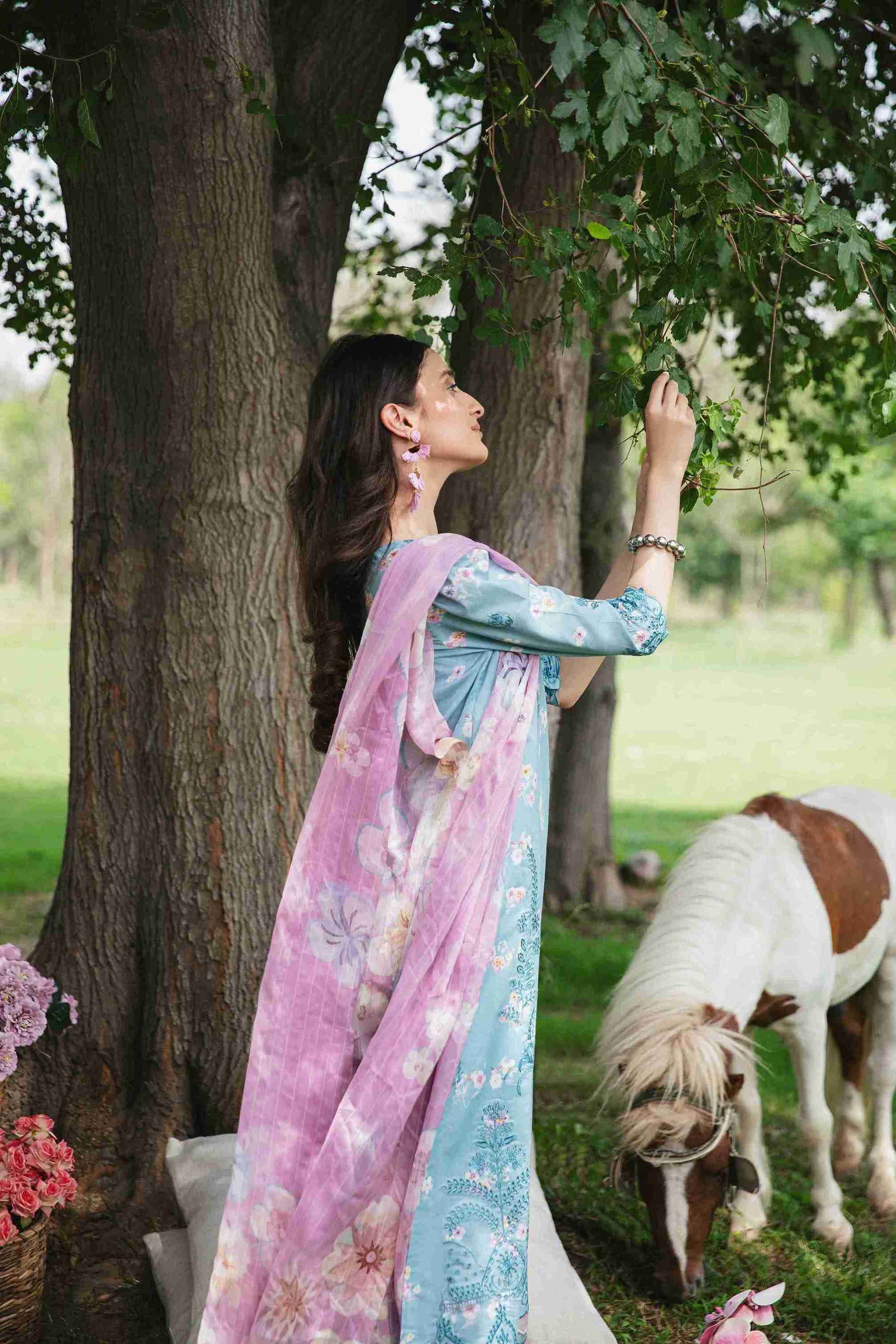 Embroidered lawn shirt paired with chiffon dupatta and plain trouser.