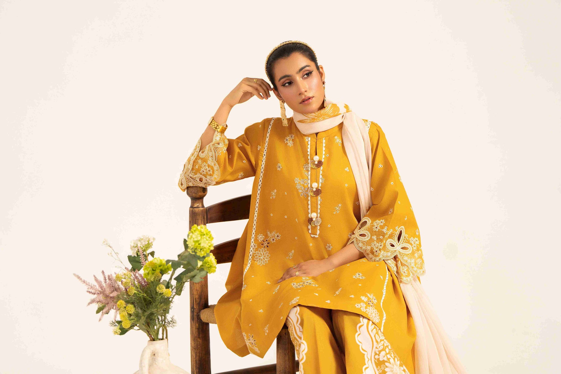 Premium embroidered lawn shirt with chiffon dupatta and plain cotton trouser fabric.