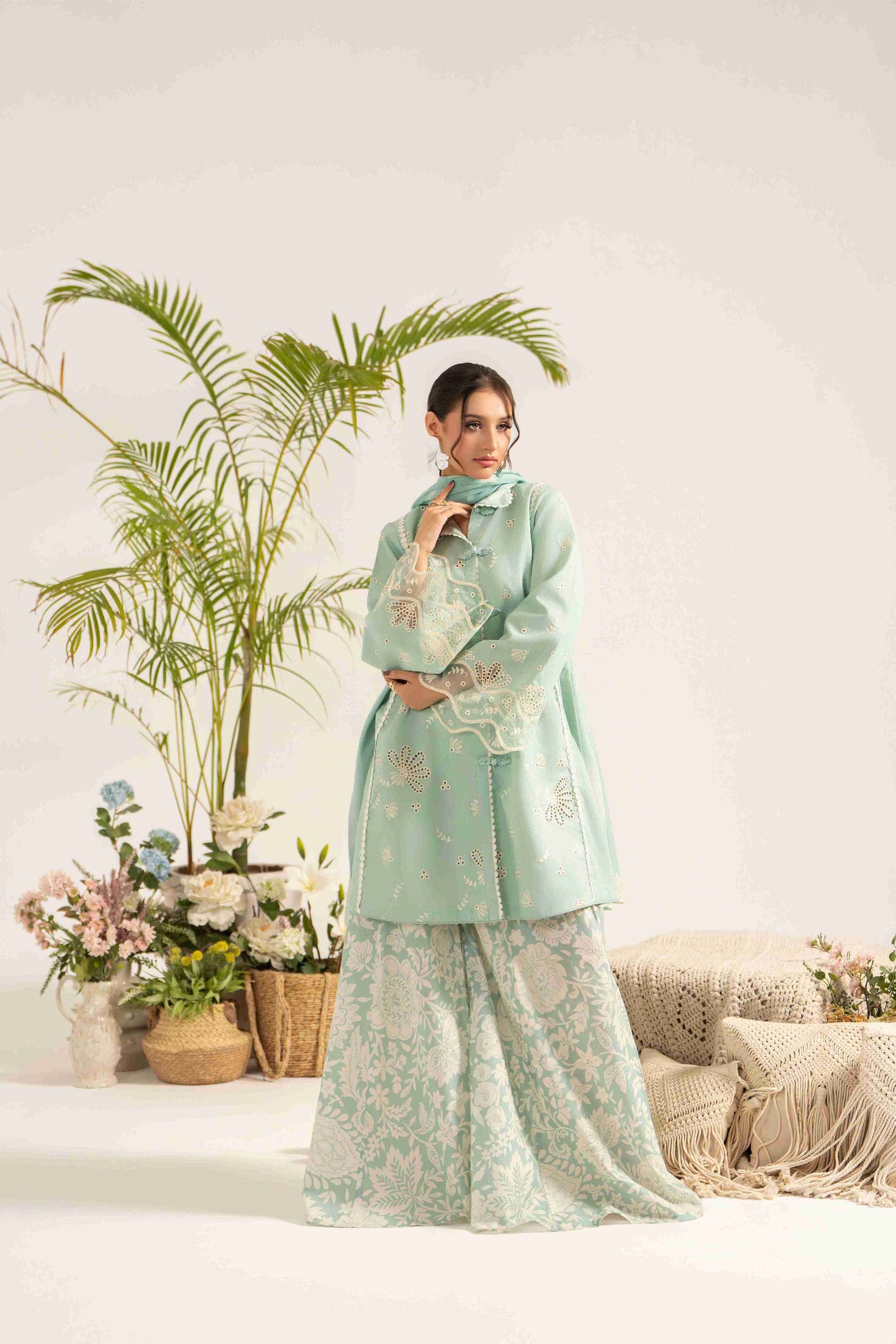 Premium embroidered lawn shirt styled with chiffon digital dupatta and trouser.
