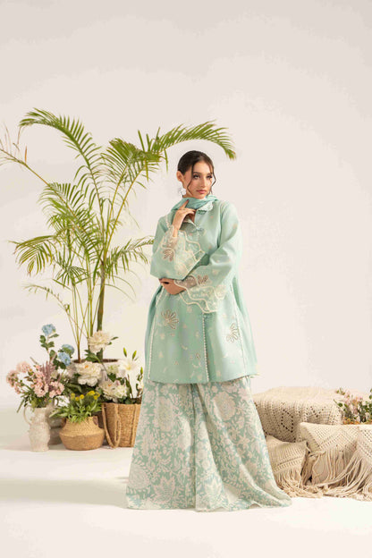 Premium embroidered lawn shirt styled with chiffon digital dupatta and trouser.