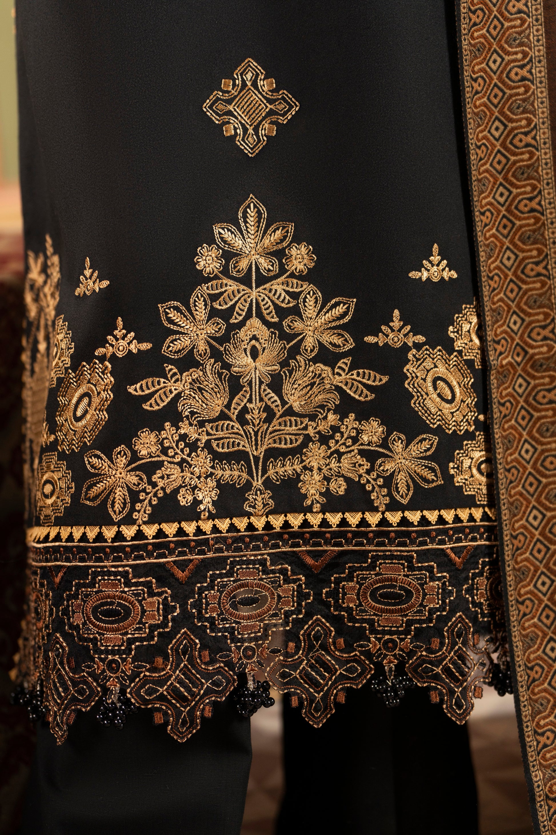 Luxury embroidered winter shirt with refined jacquard woolen shawl and coordinated plain bottom.