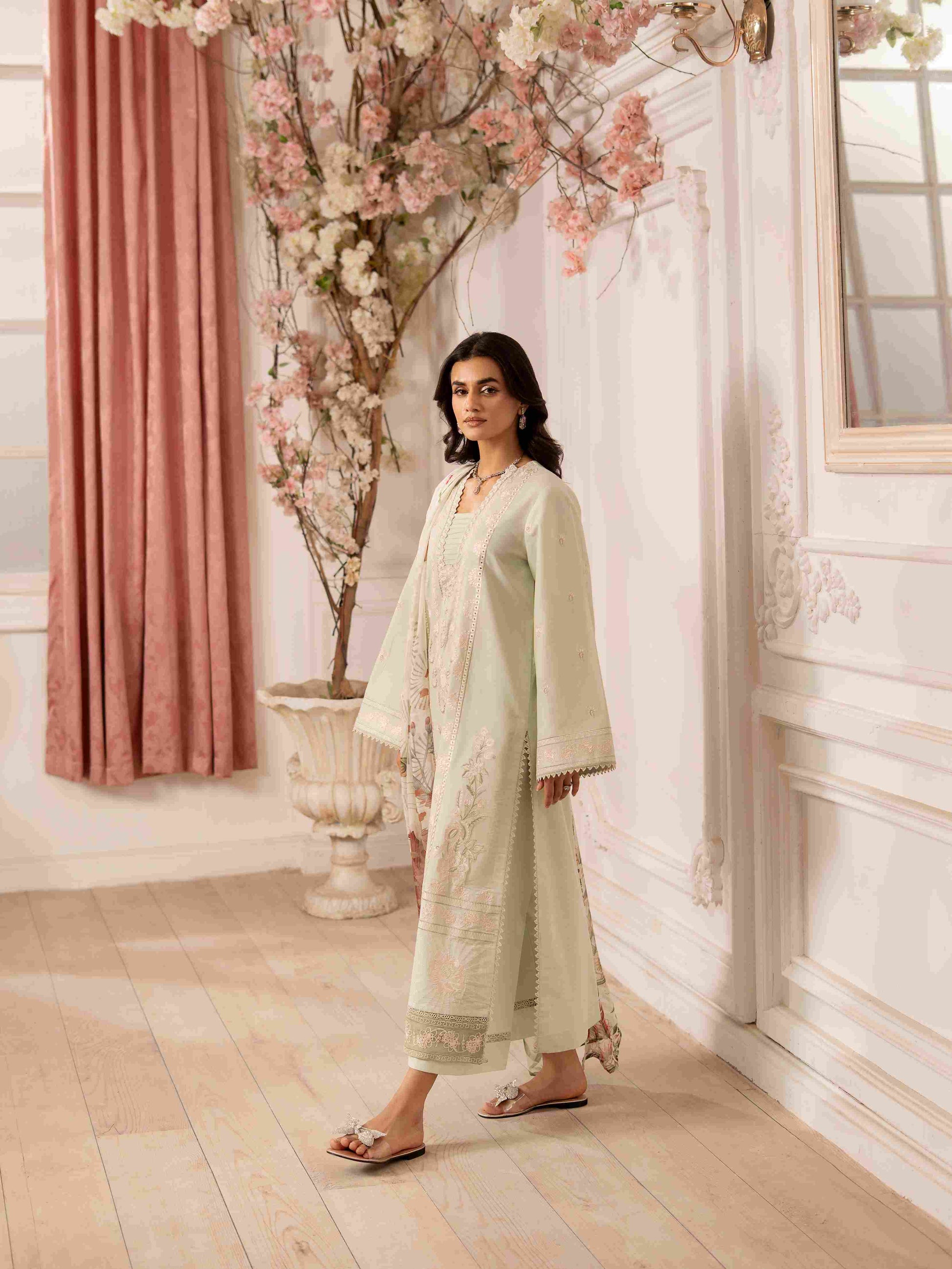 Premium embroidered lawn shirt matched with chiffon dupatta and cotton trouser