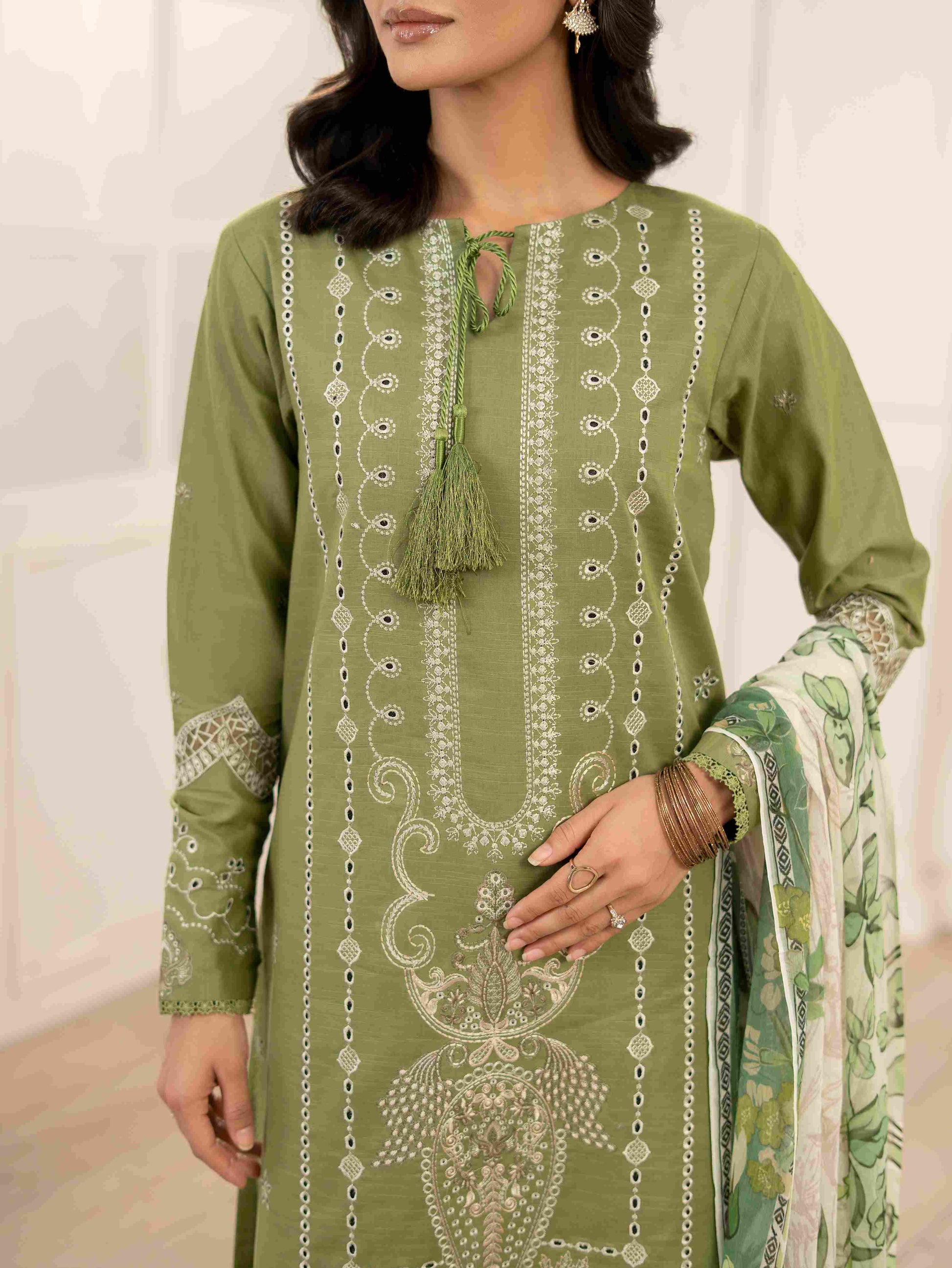 Premium embroidered lawn shirt matched with organza patch and cotton trouser