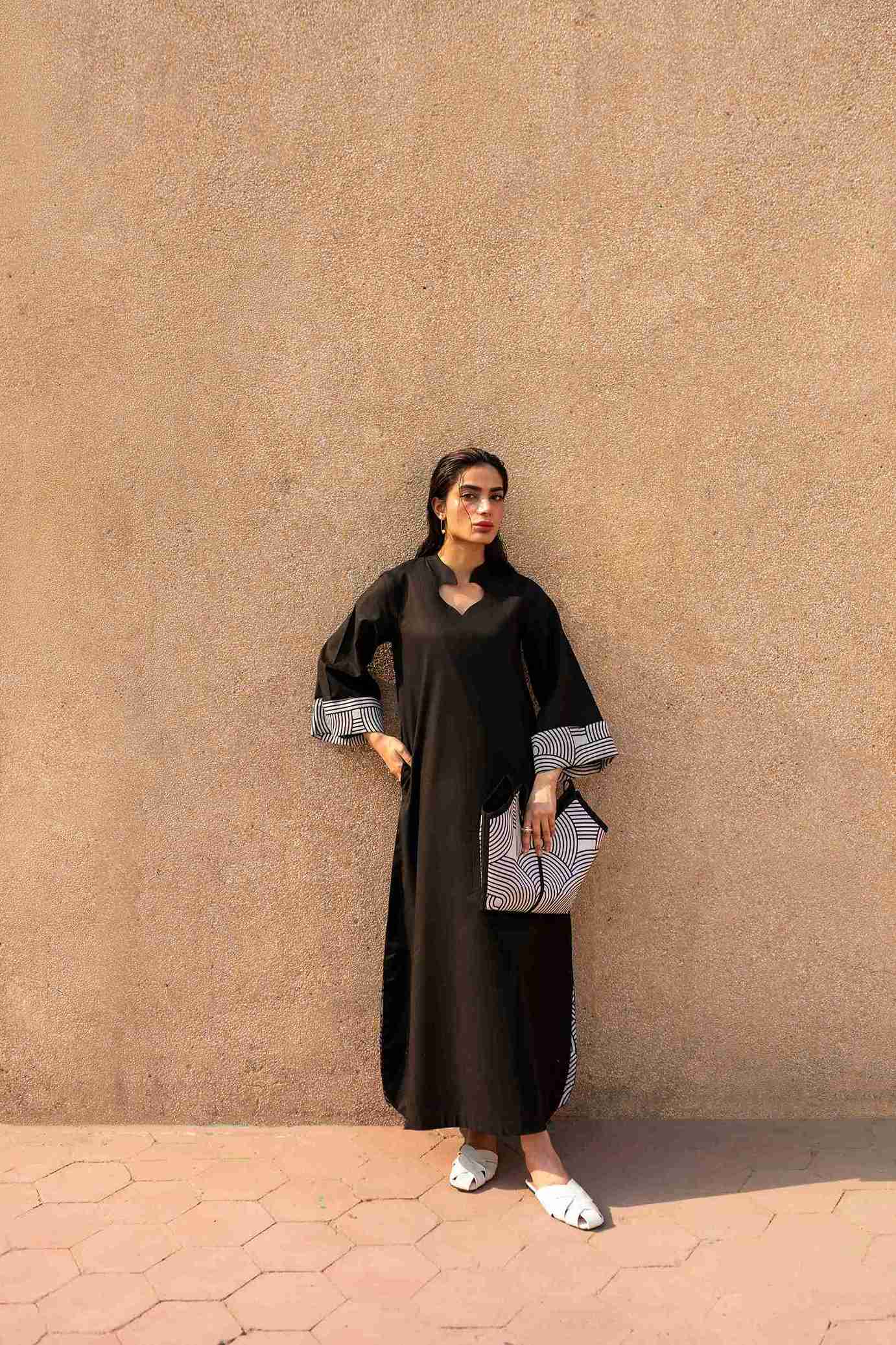 Stitched Jacquard kurta with bell sleeves and cotton trouser designed for chic looks