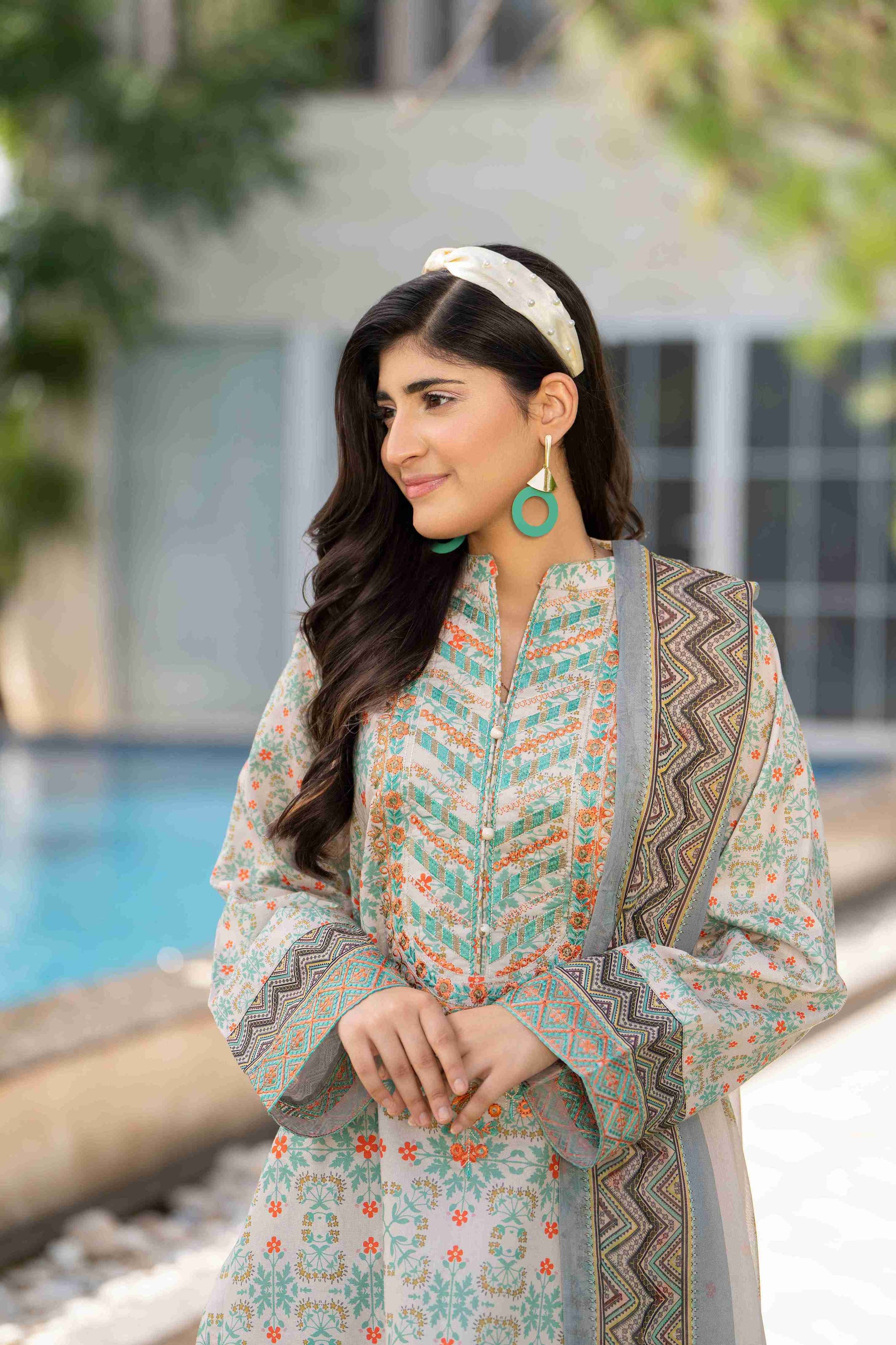 Elegant embroidered summer kurta with chiffon dupatta and cotton trouser designed for formal events