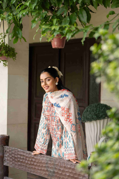Elegant eastern outfit crafted from branded lawn, featuring embroidered neckline and chiffon dupatta with cotton trousers.