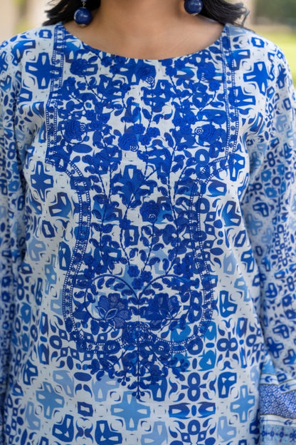 Elegant three-piece lawn outfit with embroidery details, cotton trouser, and chiffon dupatta