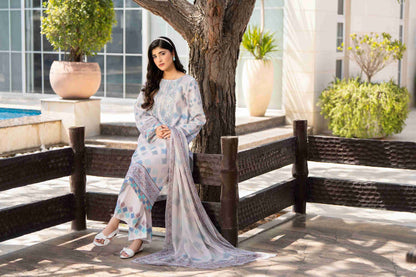 Unique embroidered kurta styled with soft chiffon dupatta and cotton trouser