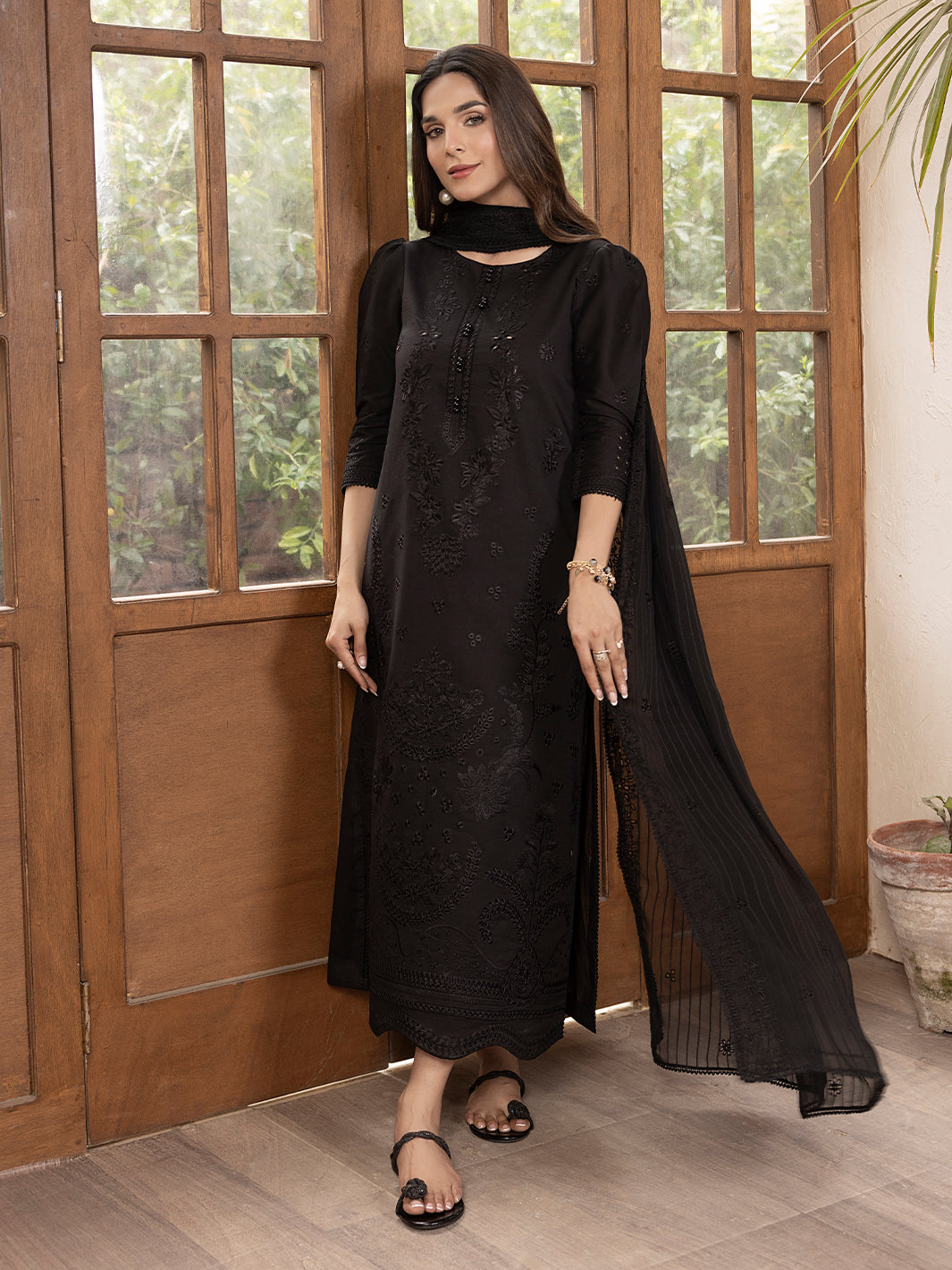 Elegant embroidered kurta crafted from lawn fabric with unique eastern detailing