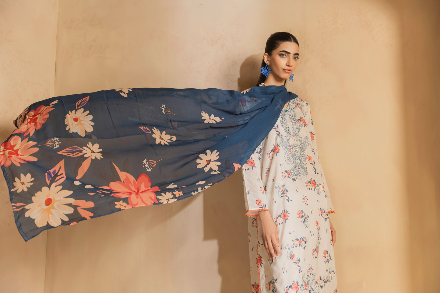 Eastern wear set including self-check embroidered lawn shirt, printed sleeves, chiffon dupatta, and plain trouser