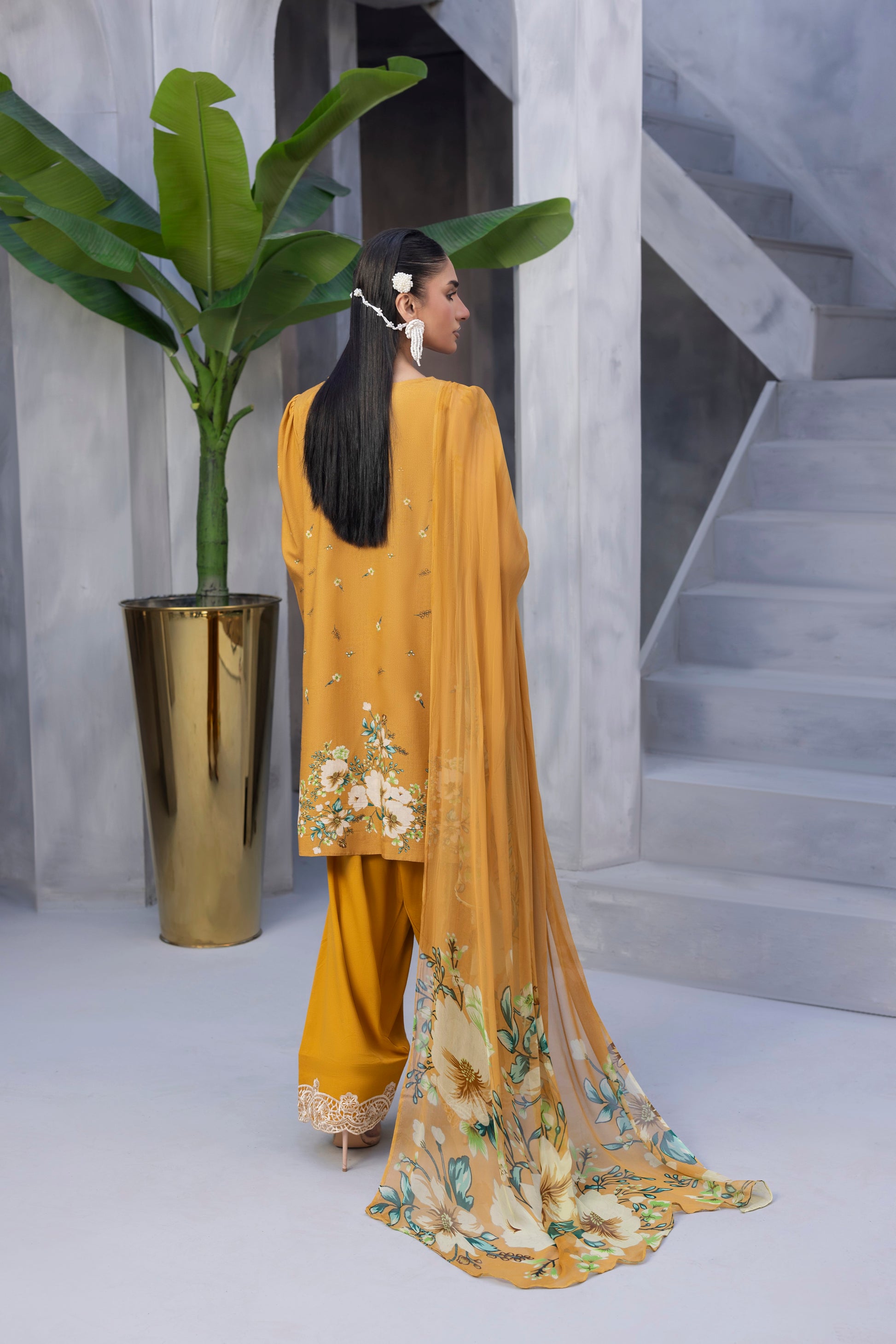 Elegant embroidered Karandi winter outfit for formal events