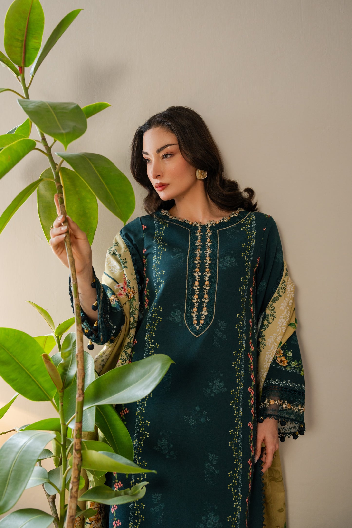 Cozy winter printed shirt paired with embroidered organza borders and dyed trousers.