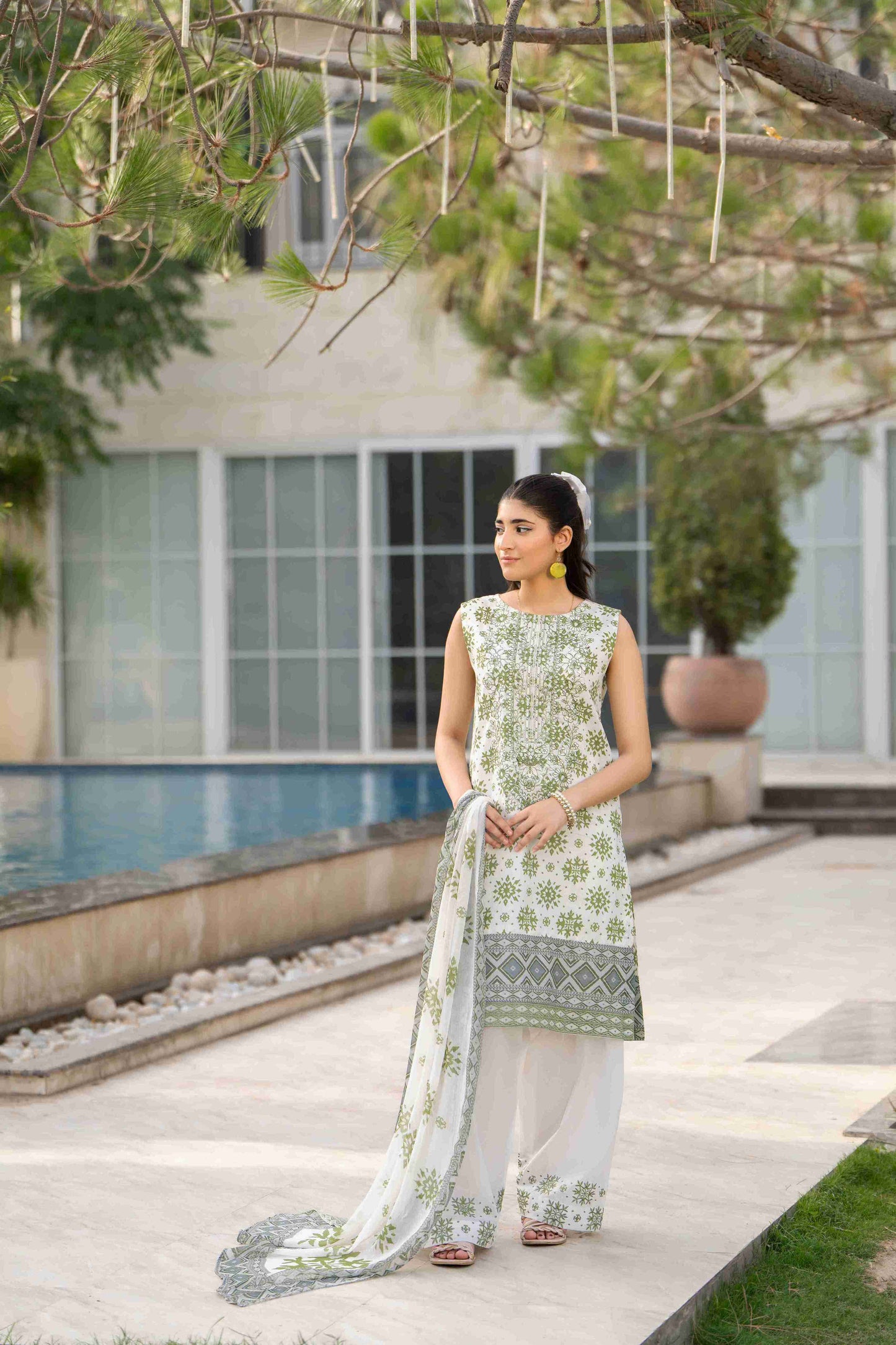 A graceful kurta design for girls, featuring soft printed lawn, delicate embroidery, and a light chiffon dupatta