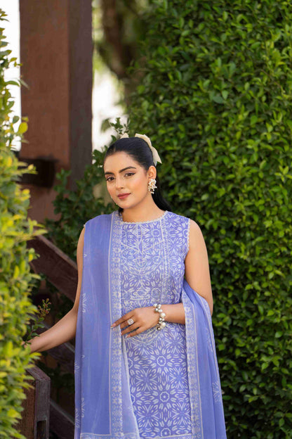 A delicate floral print on a cool lawn, paired with a cotton trouser and a soft, flowy dupatta for timeless appeal
