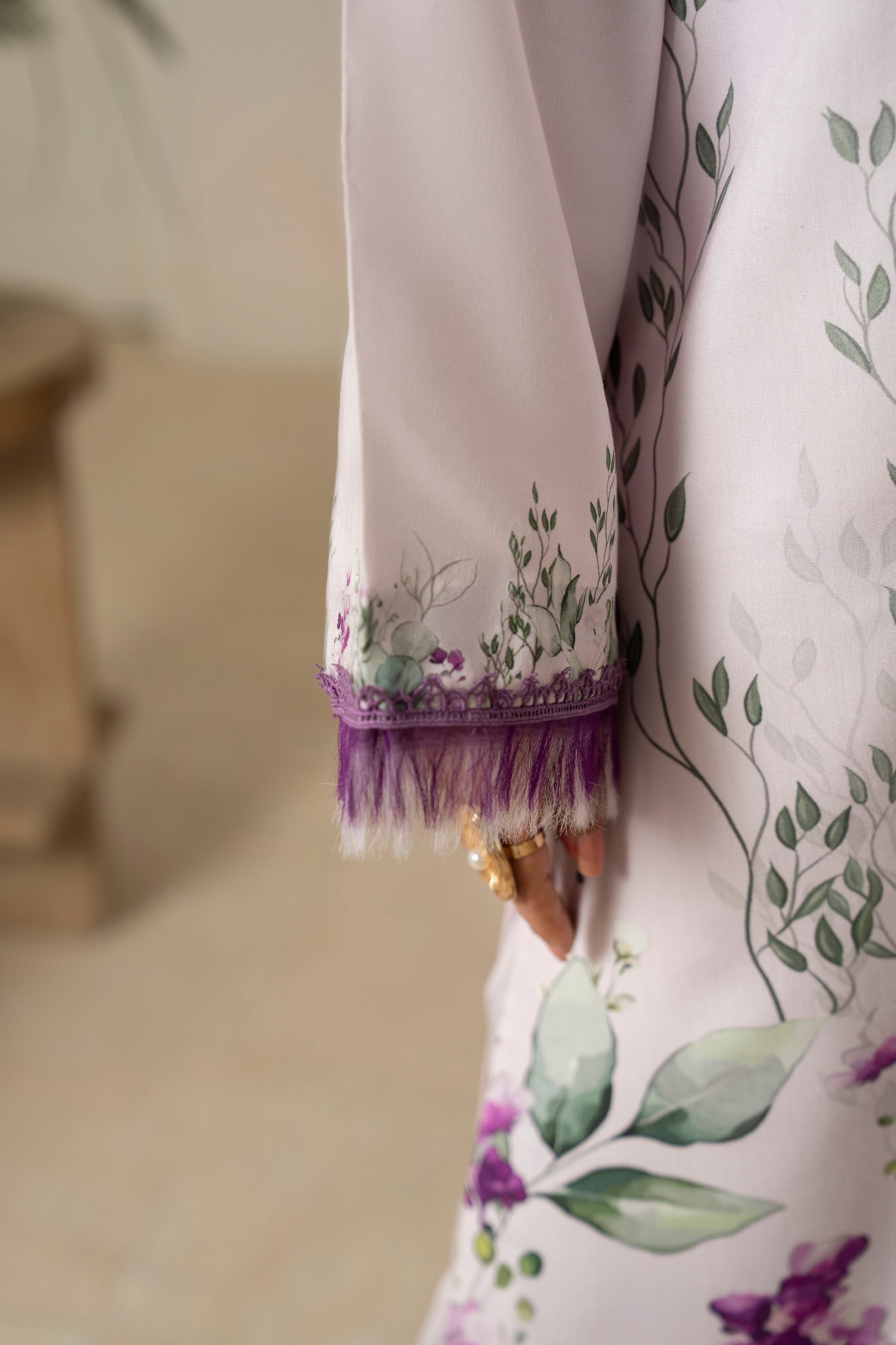 Fashionable viscose shirt featuring bold prints and an embroidered neckline