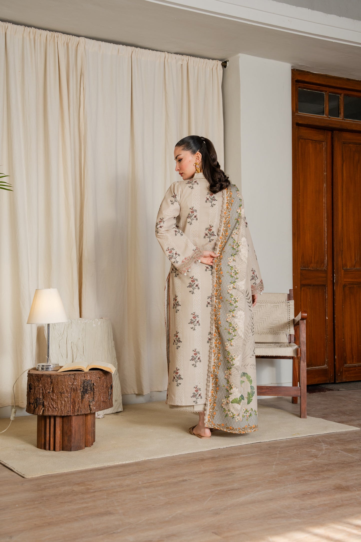 Khaddar printed dress with embroidered sleeves and neat dyed trouser.