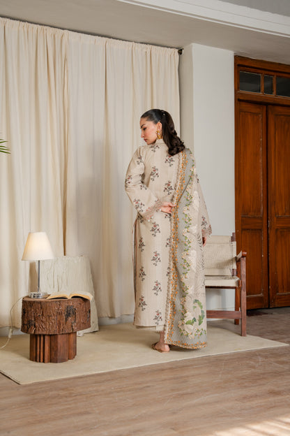 Khaddar printed dress with embroidered sleeves and neat dyed trouser.