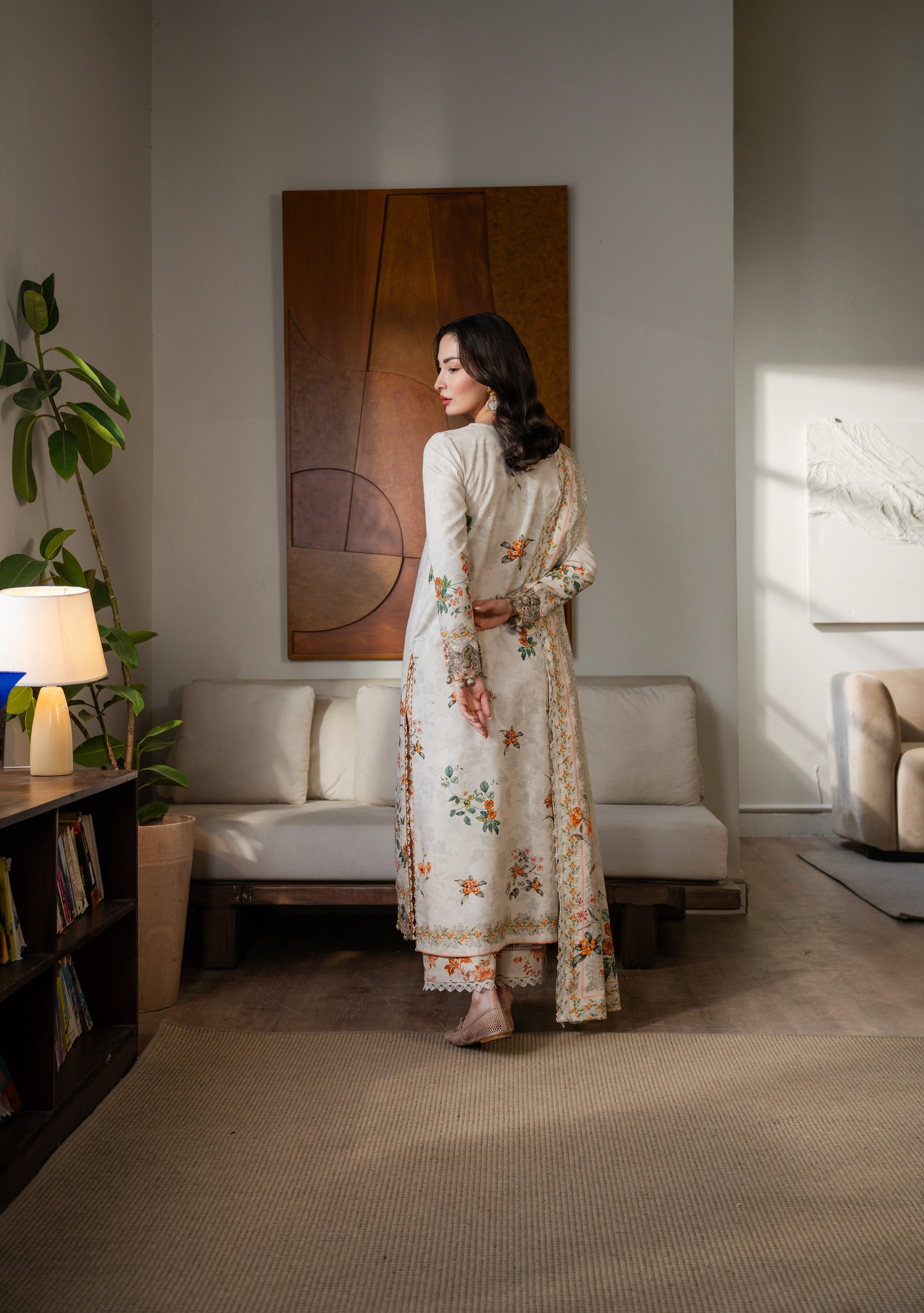 Stylish printed khaddar shirt with organza embroidery perfect for winter outings.