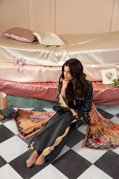 Raw silk shirt and trouser set with a delicate chiffon dupatta, forming a premium unstitched 3PC Pakistani suit designed for customized styling at weddings, parties, Eid celebrations, and formal events