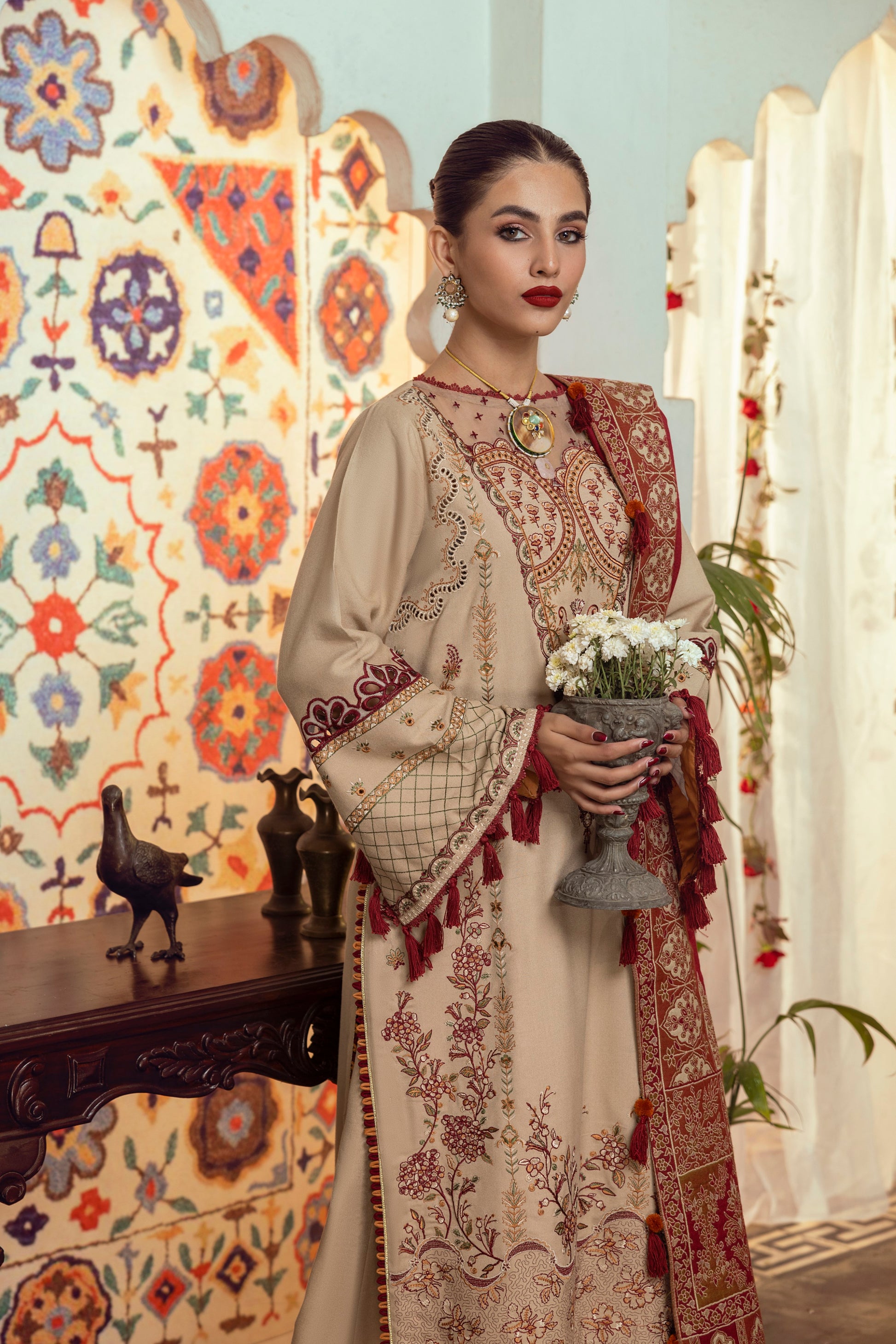 A frost-inspired winter ensemble featuring Marina detailing, a crisp organza neckline, and a premium Kashmiri shawl.