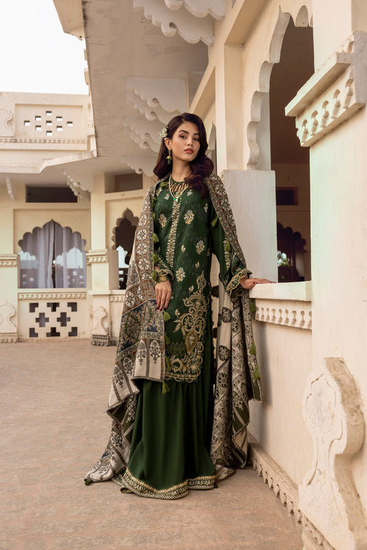 Unstitched winter design built around a handmade Kashmiri shawl, embroidered front panel, and classic trousers with border detailing.