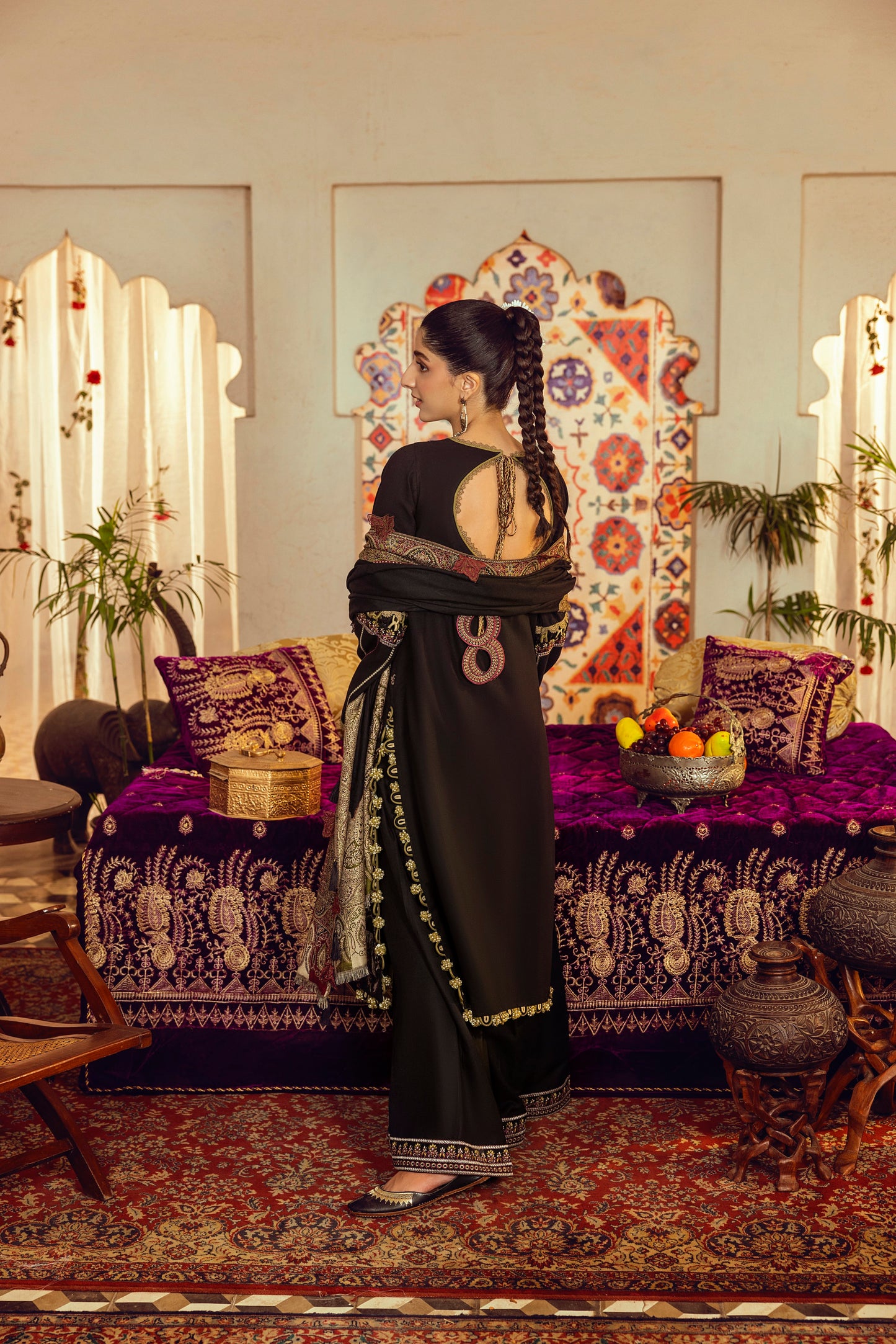 A linen-toned Marina winter dress combined with embroidered frontwork and a handwoven Kashmiri shawl.