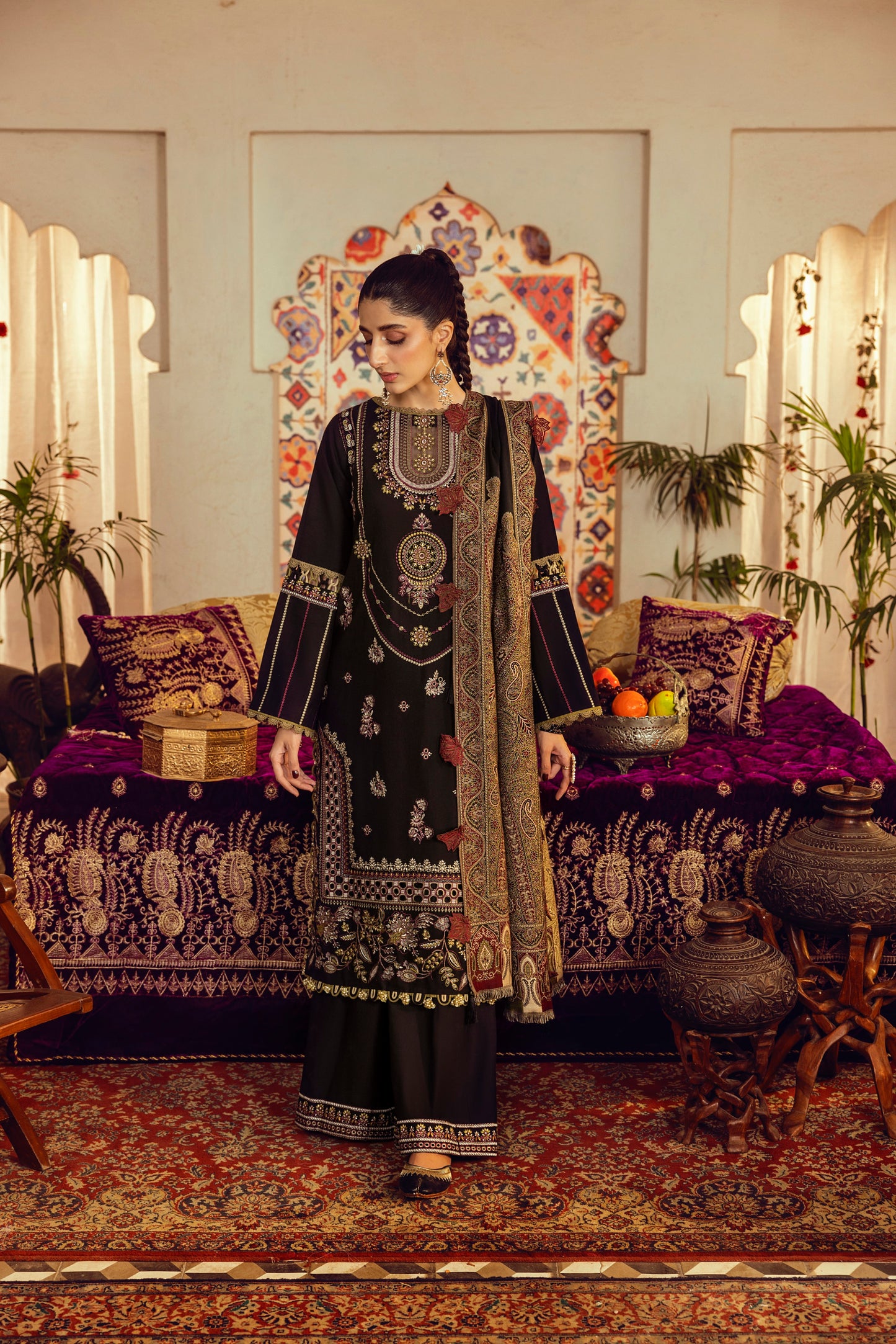 A snow-season winter suit merging Marina embroidery and a handwoven shawl crafted in Kashmiri tradition.