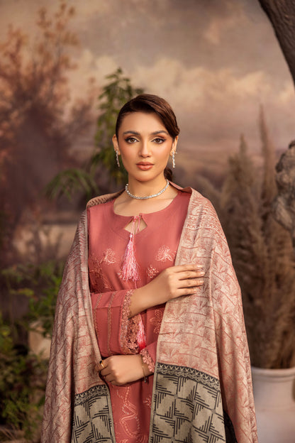 Light-toned winter suit with embroidery resembling snowflake patterns
