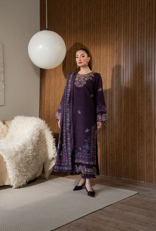 Khaddar winter outfit with embroidered organza neckline and borders for an elegant look.