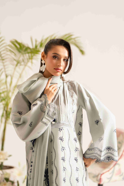 Soft embroidered lawn shirt matched with chiffon dupatta and plain cotton trouser.