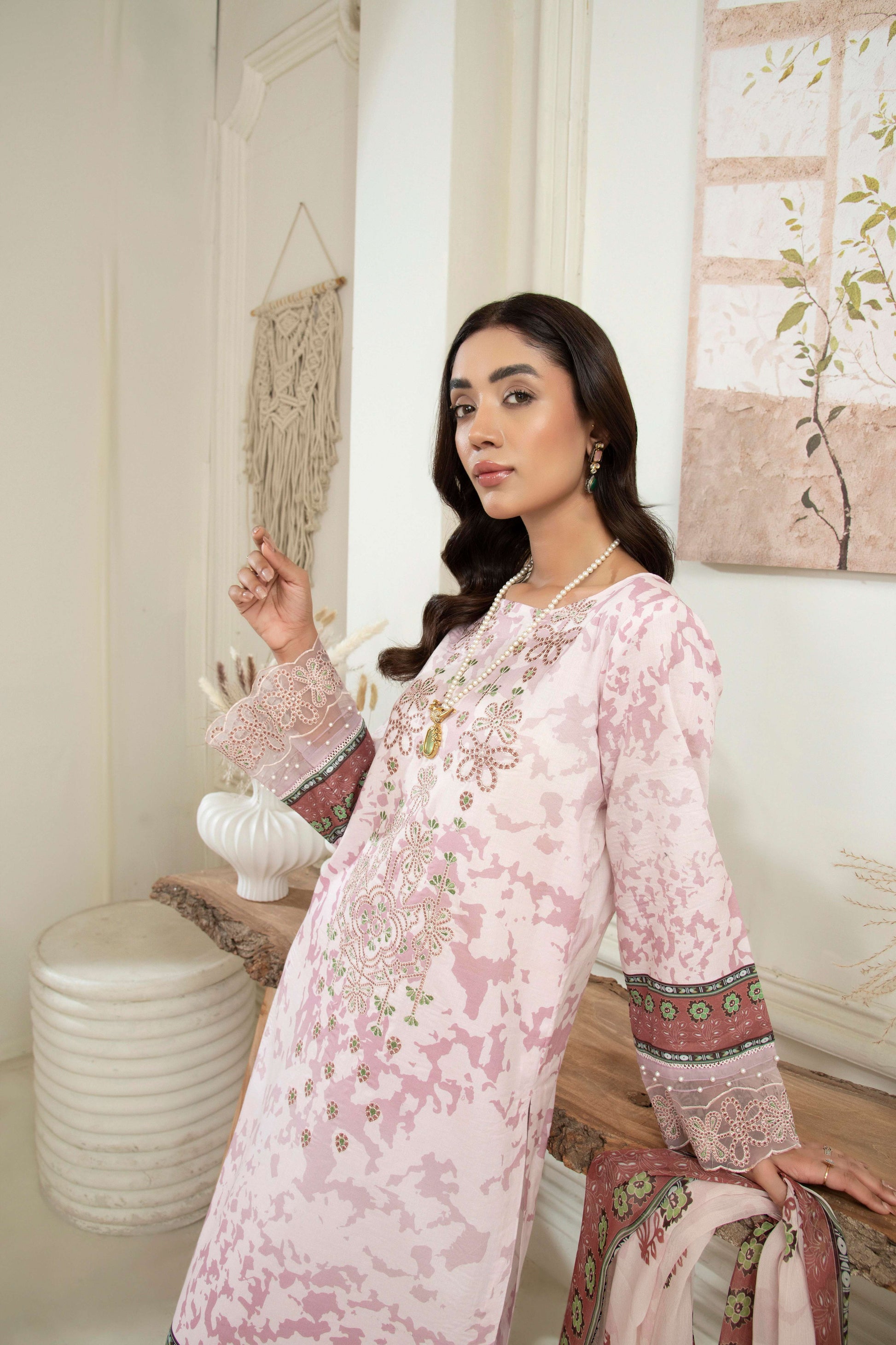  Embroidered lawn suit with matching dupatta.