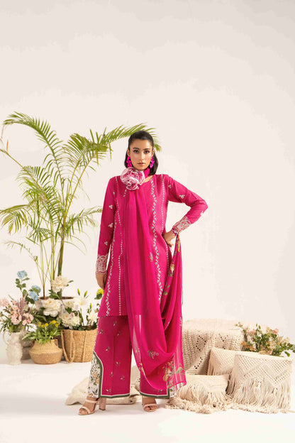 Stylish embroidered lawn shirt styled with chiffon dupatta and plain cotton trouser.