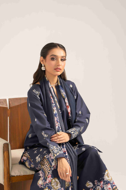 Stylish embroidered lawn shirt paired with chiffon dupatta and soft cotton trouser.