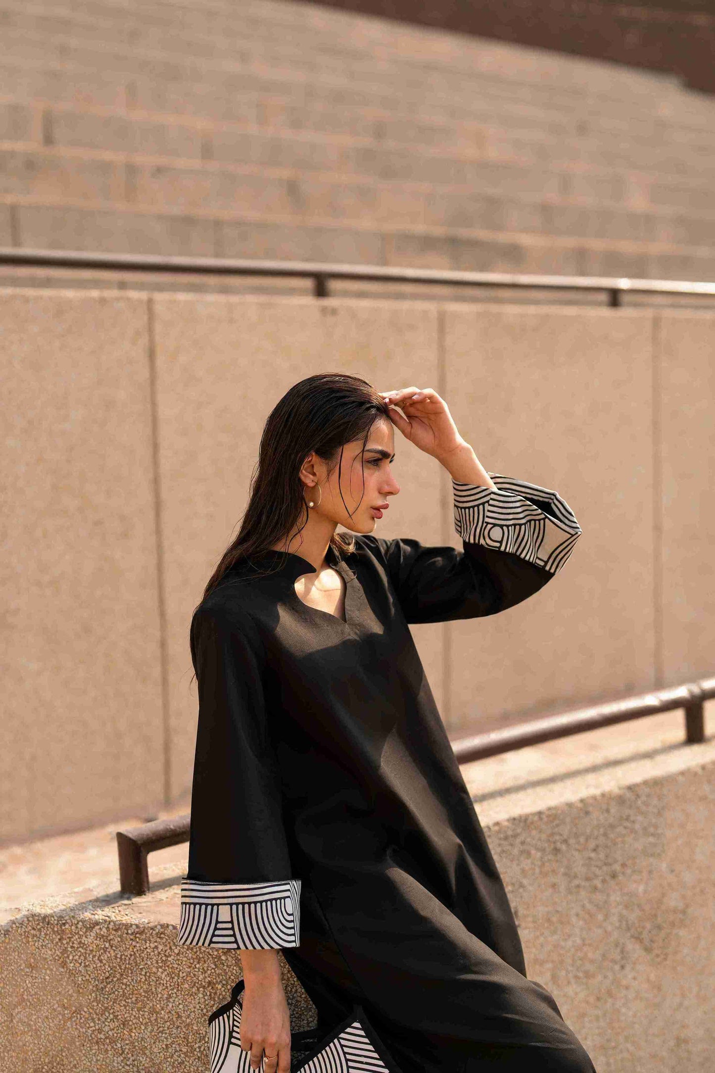 Crisscross neckline Jacquard tunic paired with bell bottom trouser for trendy girls