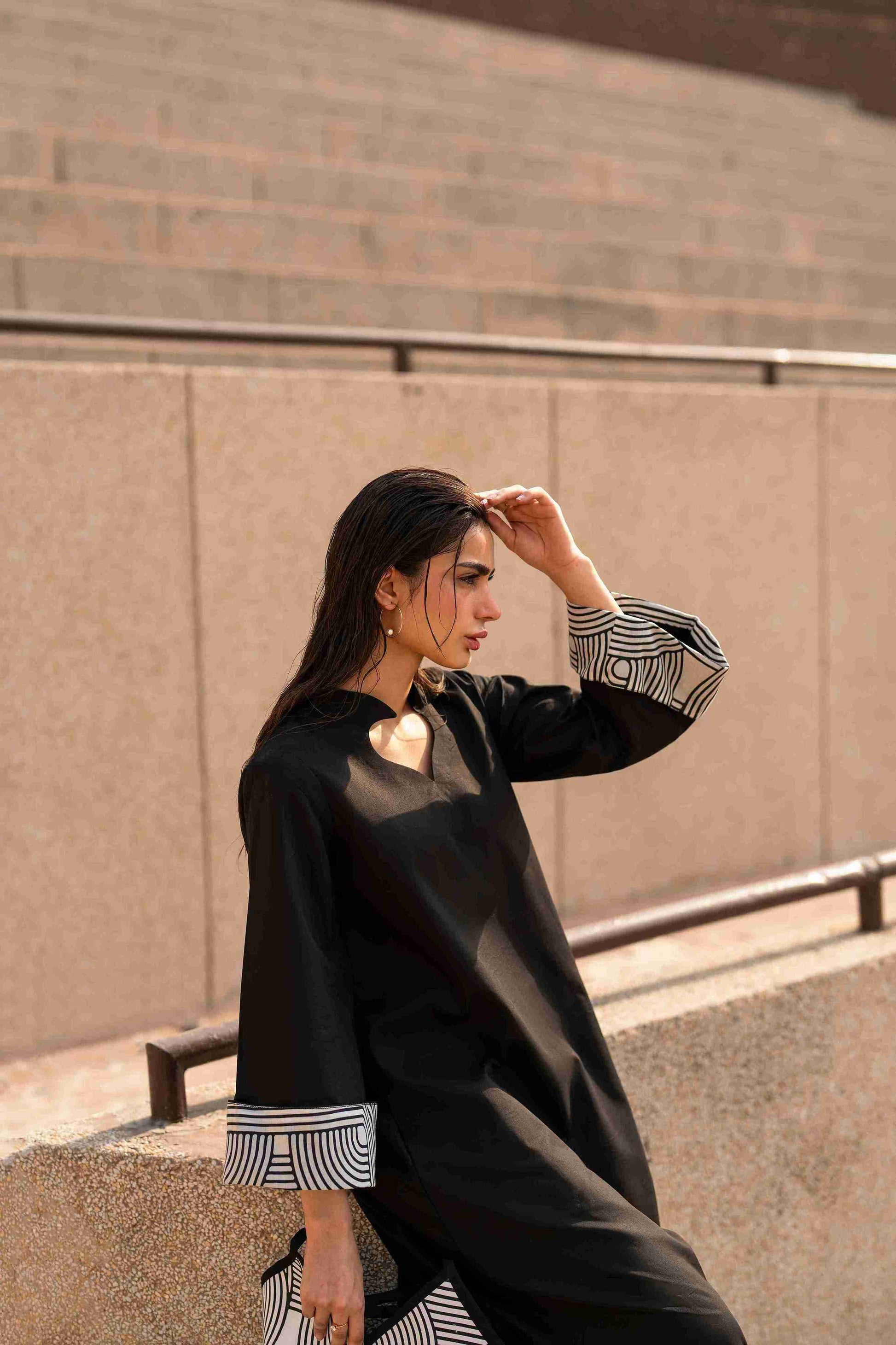 Crisscross neckline Jacquard tunic paired with bell bottom trouser for trendy girls