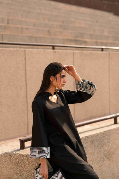 Crisscross neckline Jacquard tunic paired with bell bottom trouser for trendy girls